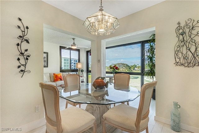 dining area with a notable chandelier