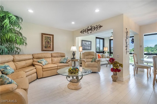 living room with light hardwood / wood-style flooring