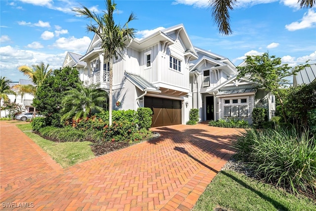 91 14th St S, Naples, FL 34102 - view of front of home featuring a garage