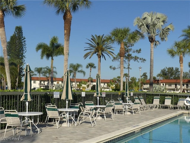 view of swimming pool featuring a patio area