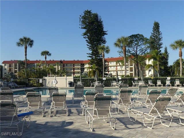 view of swimming pool featuring a patio area