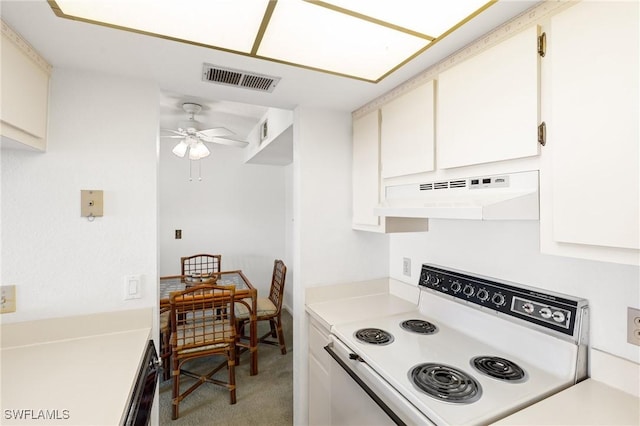 kitchen featuring range with electric stovetop, light carpet, white cabinets, and ceiling fan