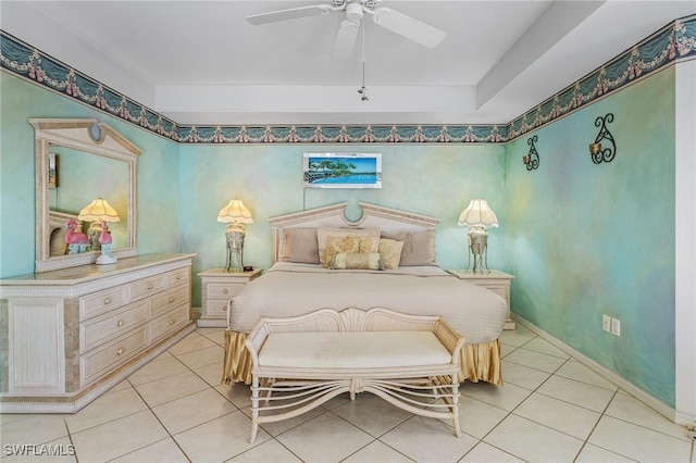 tiled bedroom featuring ceiling fan