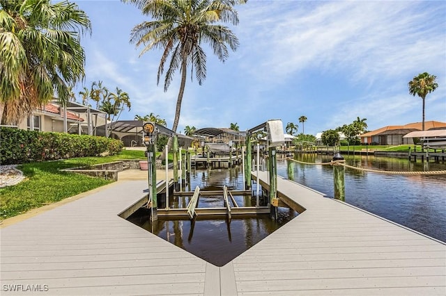 dock area with a water view and glass enclosure