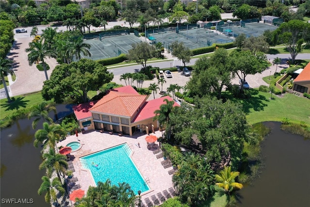 birds eye view of property featuring a water view