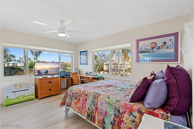 bedroom featuring light hardwood / wood-style floors and ceiling fan