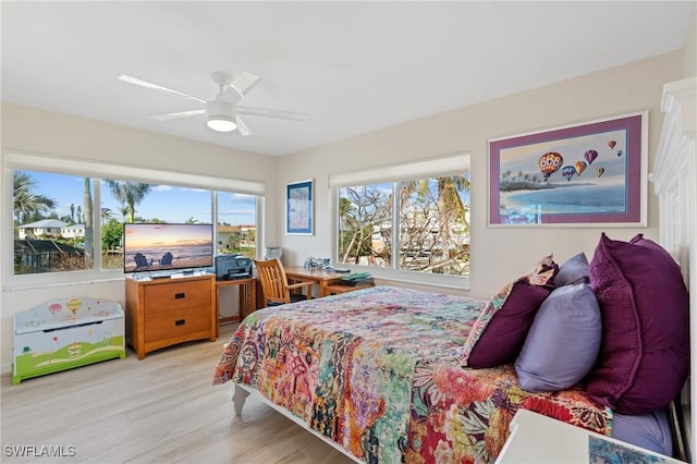 291 Flamingo St, Fort Myers Beach, FL 33931 - bedroom with ceiling fan and light wood finished floors