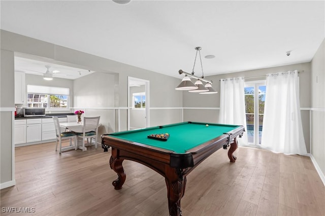 game room featuring pool table, light hardwood / wood-style flooring, and ceiling fan