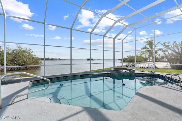 view of swimming pool with a patio, an in ground hot tub, a water view, and glass enclosure