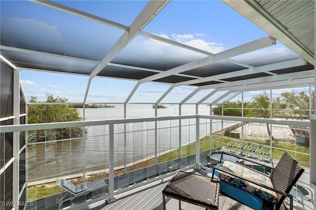 291 Flamingo St, Fort Myers Beach, FL 33931 - unfurnished sunroom featuring a water view