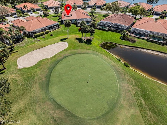 aerial view with view of golf course and a residential view