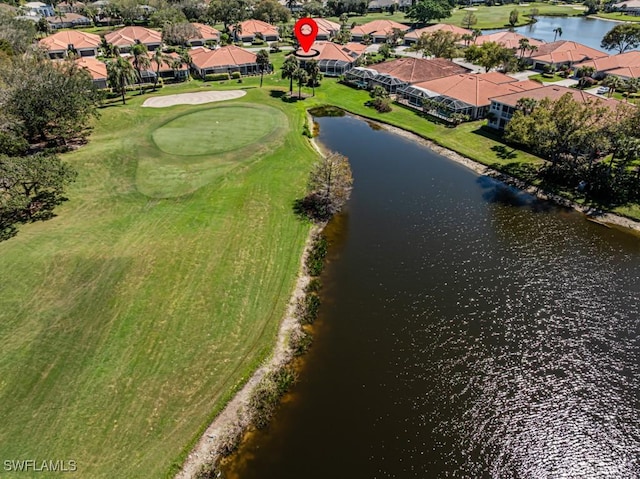 aerial view featuring a water view and a residential view