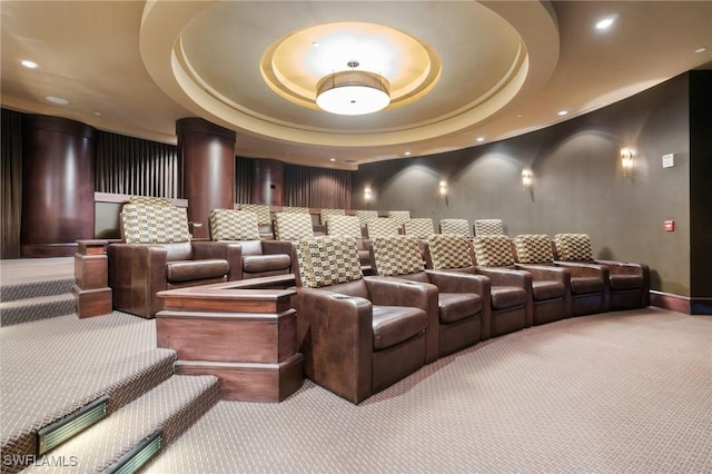 home theater room featuring carpet, a tray ceiling, and recessed lighting