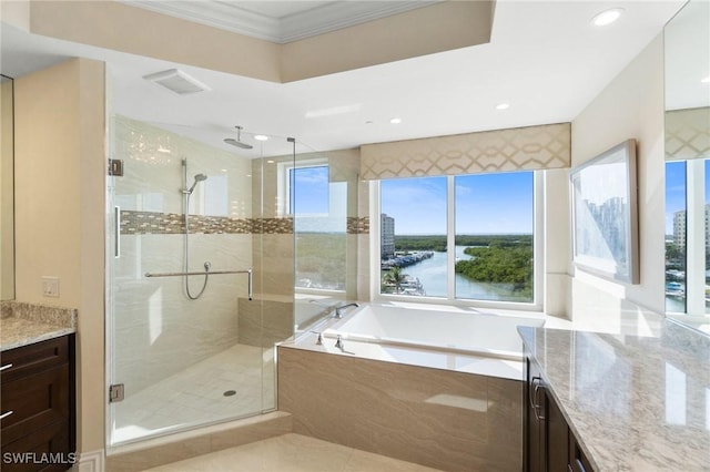 full bath with a garden tub, visible vents, ornamental molding, a stall shower, and vanity