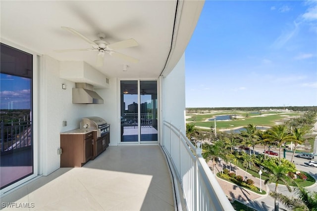 balcony with ceiling fan, grilling area, and area for grilling