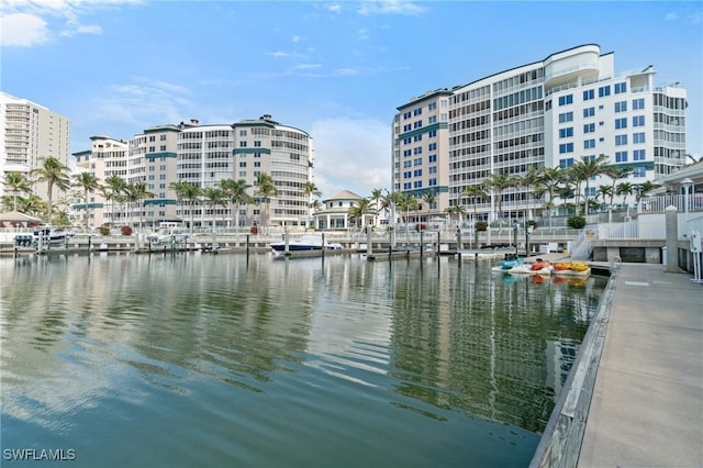 property view of water featuring a boat dock