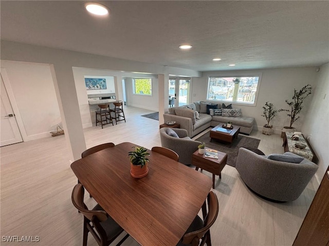 living room with light hardwood / wood-style flooring