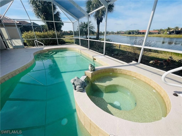 view of swimming pool featuring an in ground hot tub, a water view, and a lanai