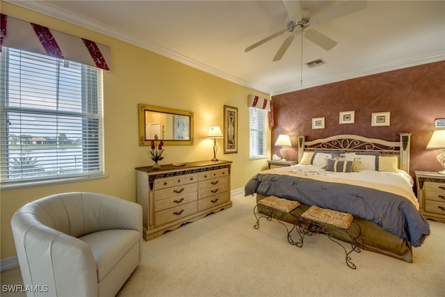 bedroom featuring light carpet, multiple windows, baseboards, and crown molding