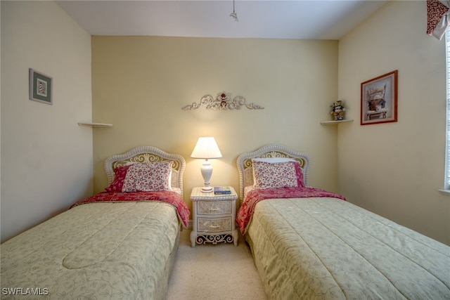 bedroom featuring carpet flooring