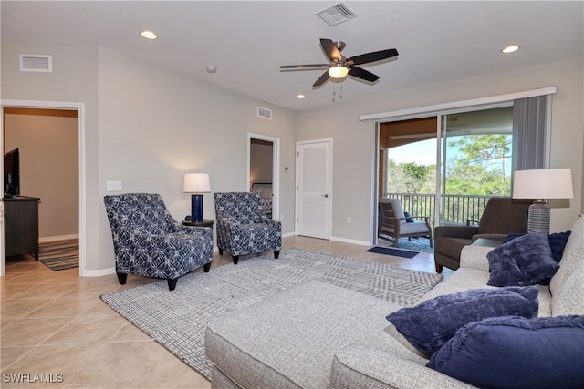 tiled living room featuring ceiling fan