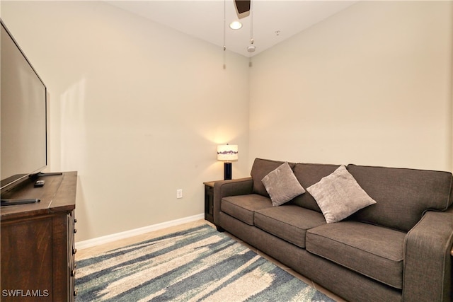 living room with ceiling fan