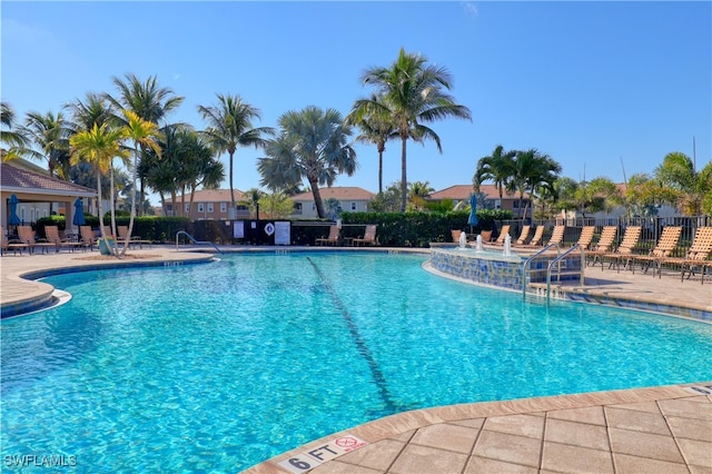 view of swimming pool with a patio area