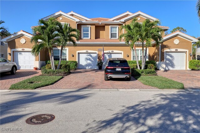 view of front of home with a garage