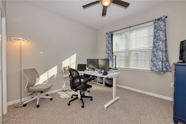 home office featuring carpet flooring and ceiling fan