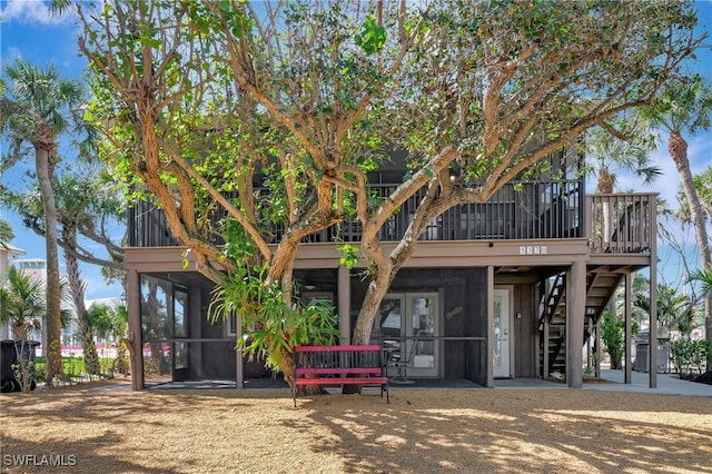 exterior space with a sunroom