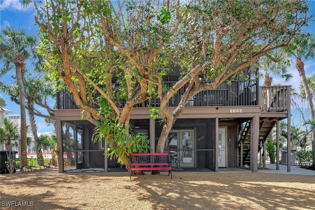 5370/5372 Palmetto St, Fort Myers Beach, FL 33931 - view of front of property featuring stairway and a wooden deck