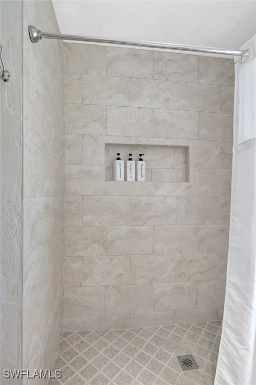 bathroom with a shower with curtain