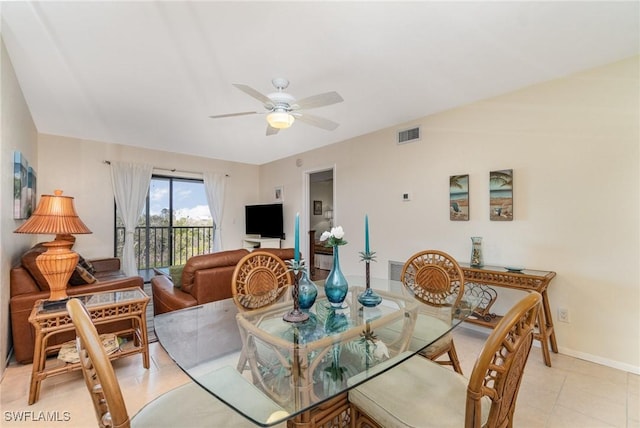 dining space with ceiling fan