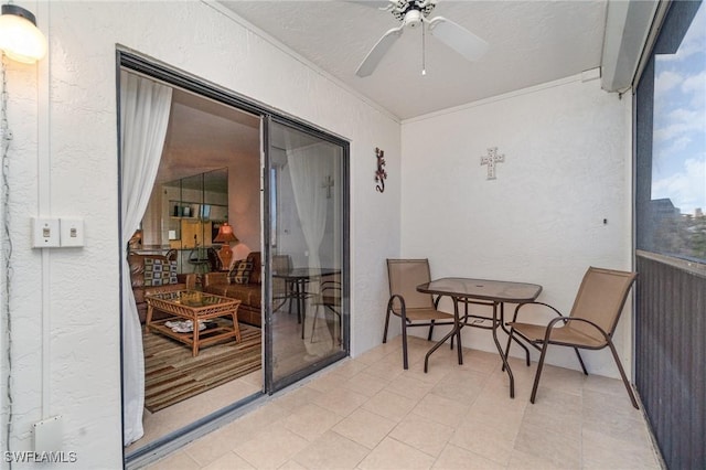 balcony featuring ceiling fan