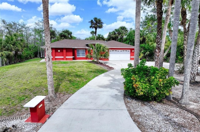 ranch-style house featuring an attached garage, a front lawn, and concrete driveway