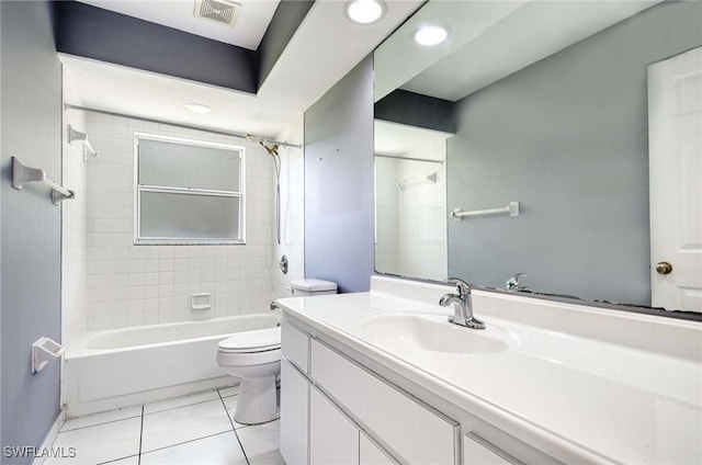 bathroom with shower / bath combination, visible vents, toilet, tile patterned flooring, and vanity