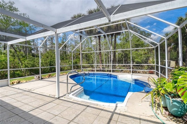 pool featuring a patio area and a lanai