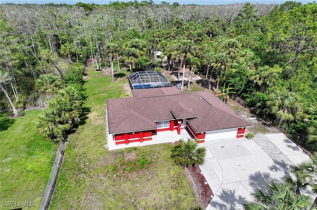 aerial view with a wooded view