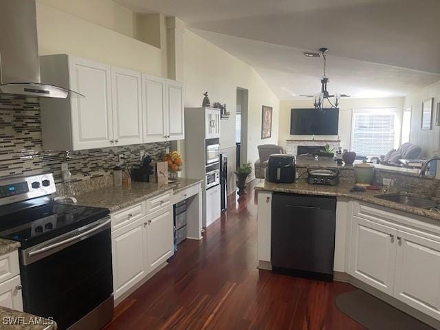 kitchen featuring black dishwasher, wall chimney range hood, white cabinets, and stainless steel electric range