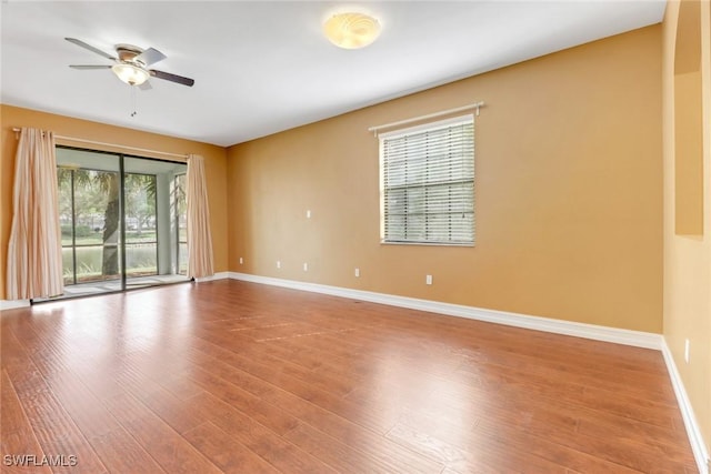 spare room featuring ceiling fan and light wood-type flooring