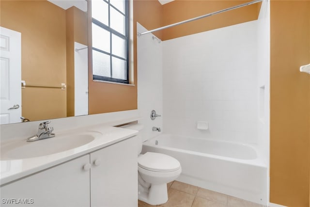 full bath with tile patterned flooring, toilet, vanity, and bathtub / shower combination