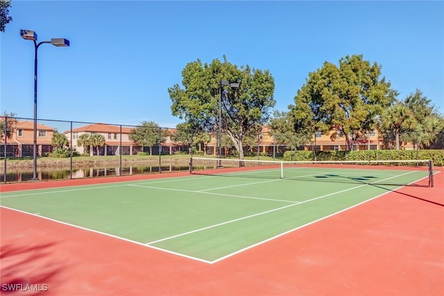 view of sport court with basketball hoop