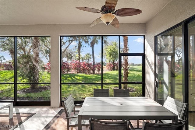 sunroom / solarium with ceiling fan