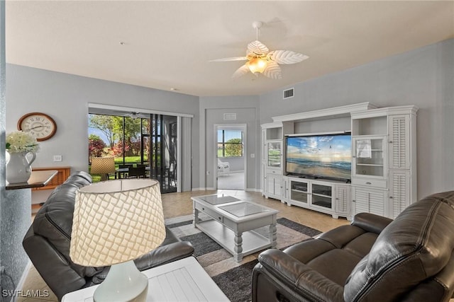 living room featuring ceiling fan