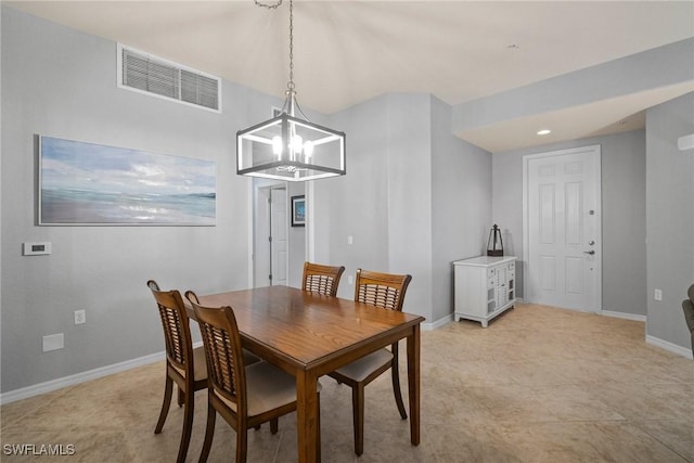 dining room featuring a notable chandelier