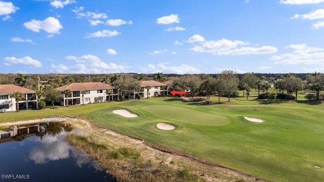 surrounding community featuring a yard and a water view