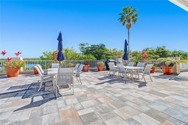 view of patio / terrace featuring a water view