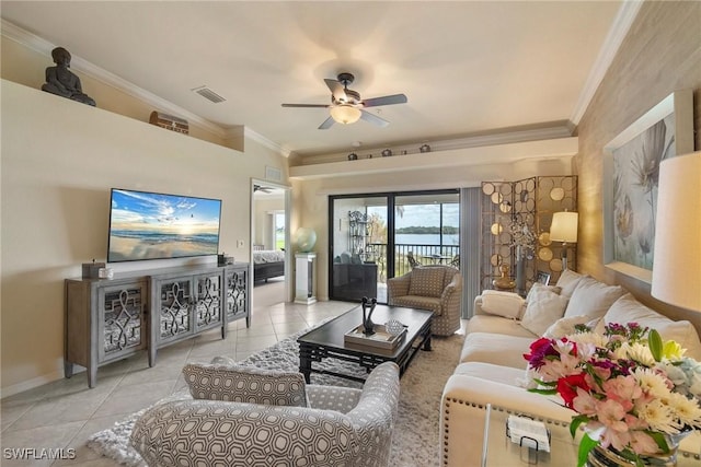 tiled living room featuring crown molding and ceiling fan