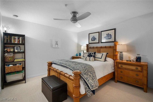 bedroom with light carpet and ceiling fan