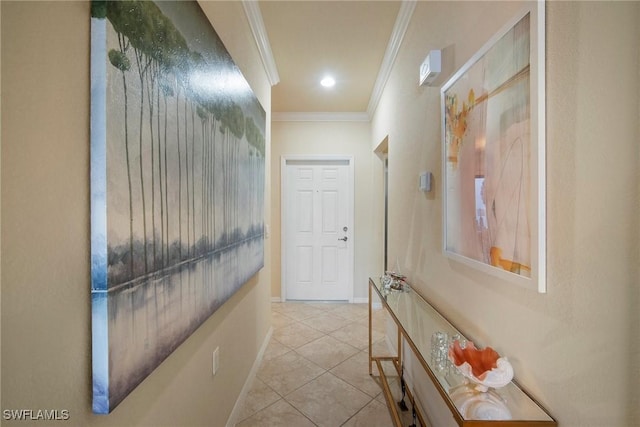 corridor with ornamental molding and light tile patterned flooring